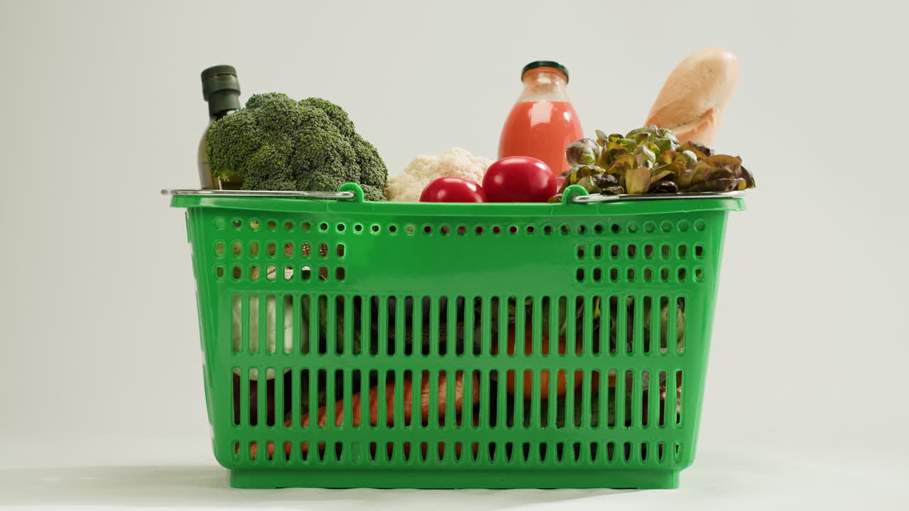 Shopping basket full of fresh produce and groceries