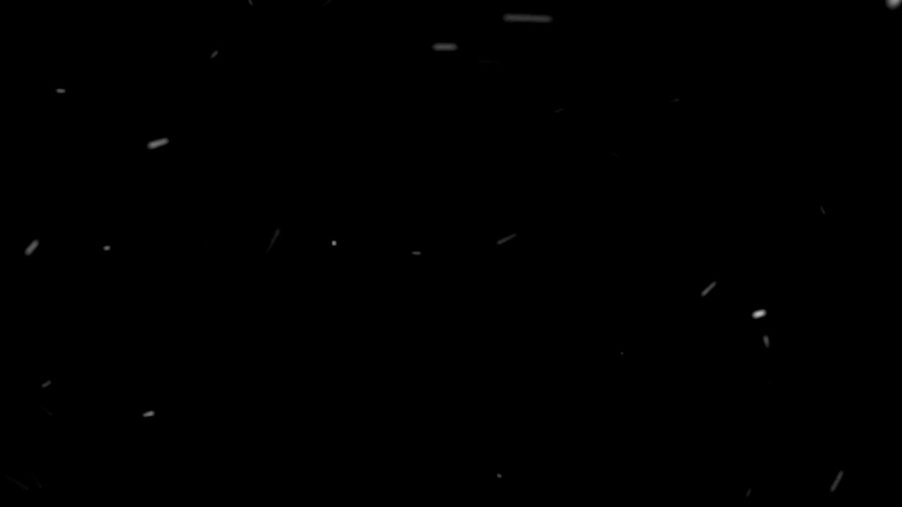 어두운 배경에서 추상적인 먼지 입자의 움직임