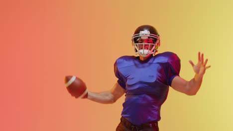 Video-Einer-Nahaufnahme-Eines-Kaukasischen-American-Football-Spielers-Mit-Helm-Und-Ball-Auf-Orangefarbenem-Hintergrund