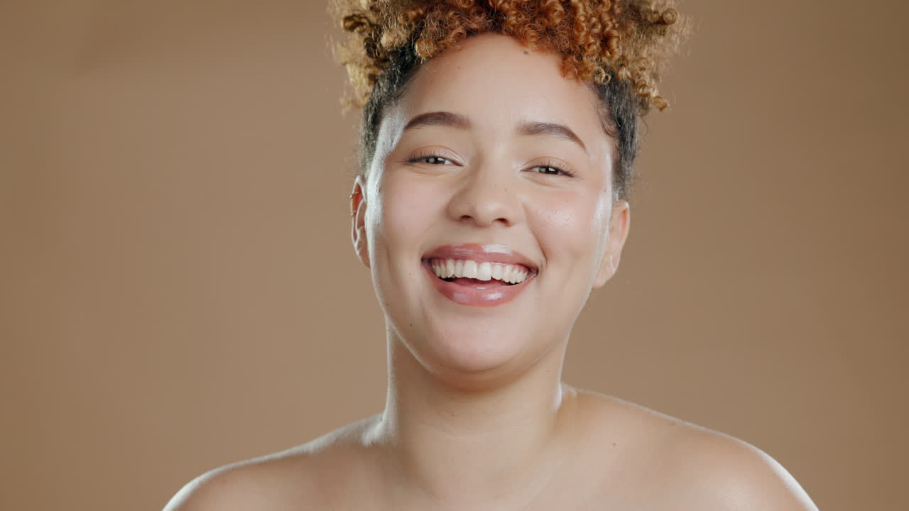 Skincare, health and face of a woman in a studio