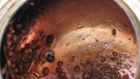 close up of the cooking process for cinnamon sugar roasted almonds