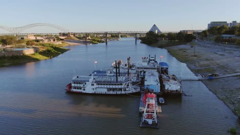 early-morning-aerial-view-of-paddle-boats-docked-with-tilting-camera-view