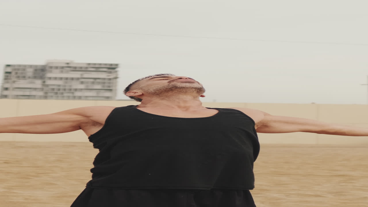 Man practicing yoga outdoors
