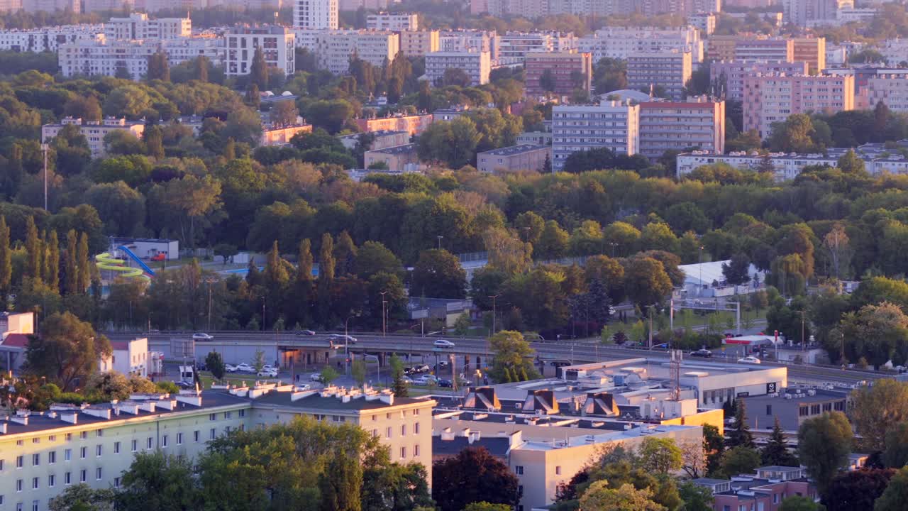 Aerial sunset view, Wola District traffic, intercity transport journey