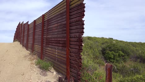 the us mexico border wall fence ends suddenly in the desert of california