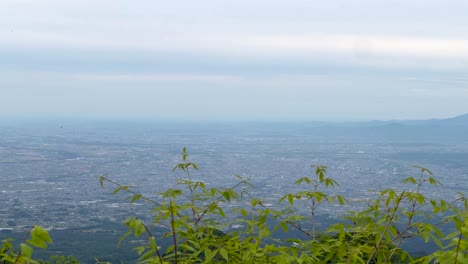stunning slider shot over high viewpoint above kanto plain in japan on cloudy day