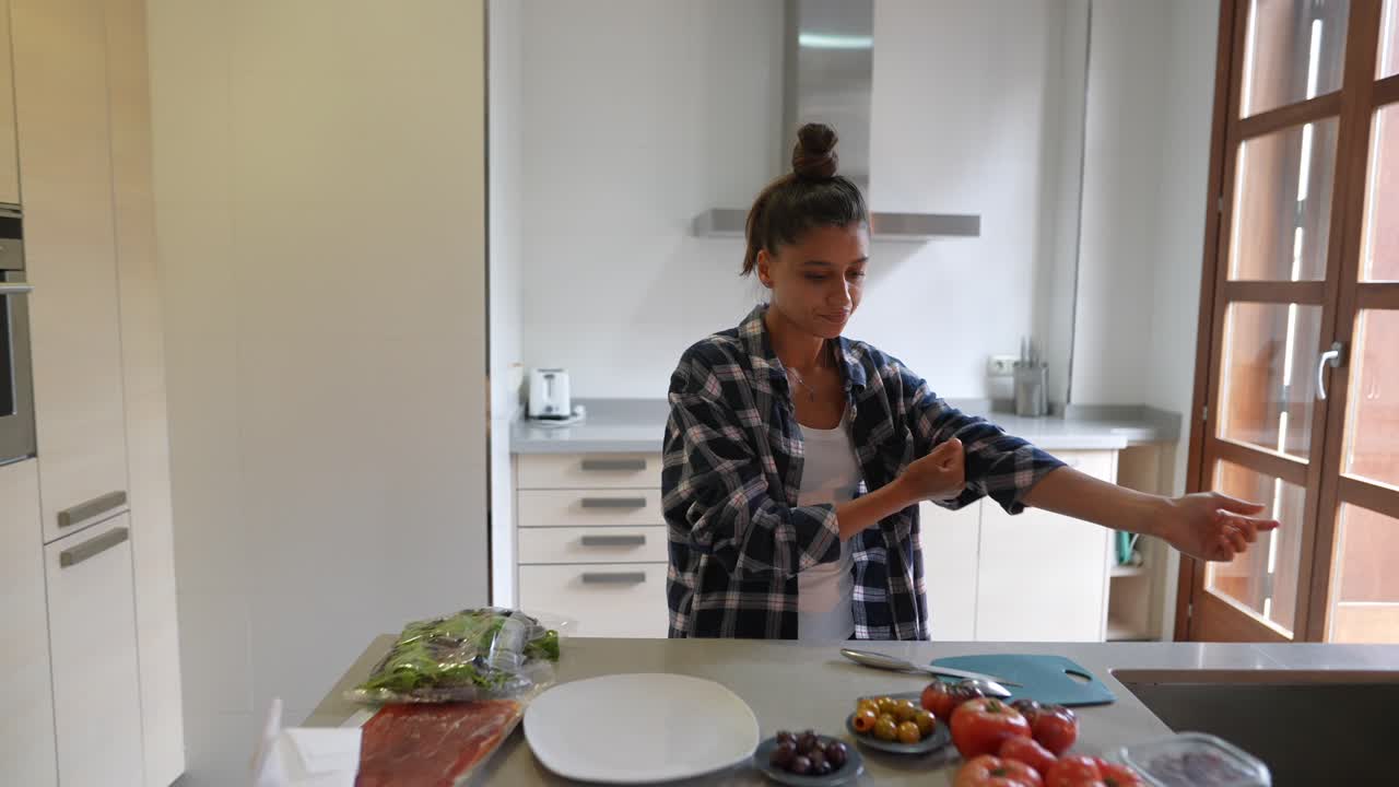Woman preparing food in a kitchen