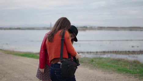 women friends enjoying nature and photography