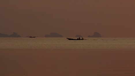 fishing boats at sunrise