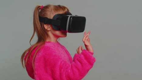 Preteen-child-girl-kid-using-headset-app-to-play-simulation-game-watching-virtual-reality-3D-video