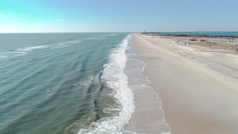 ocean waves and beach on south shore of long island in winter