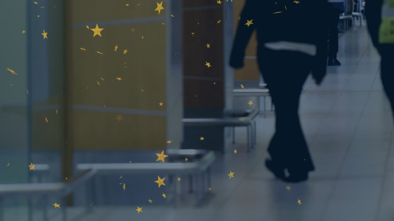 Walking in hallway, security officer surrounded by animated stars overlay