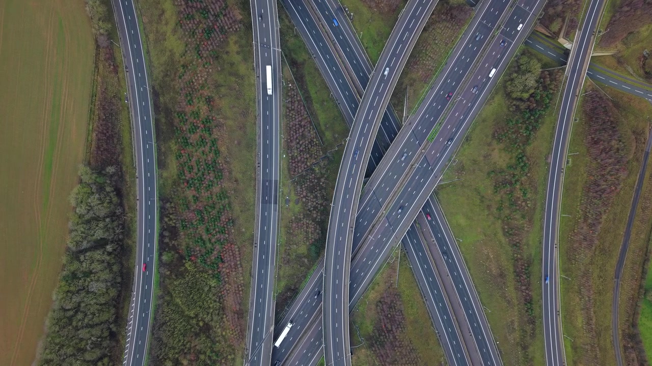 Aerial view of a major multi-level motorway intersection near Rugby, UK.