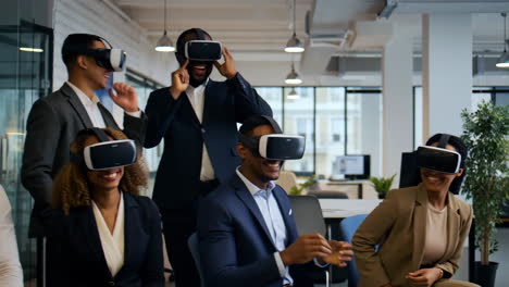 diverse business professionals experiencing virtual reality in an office