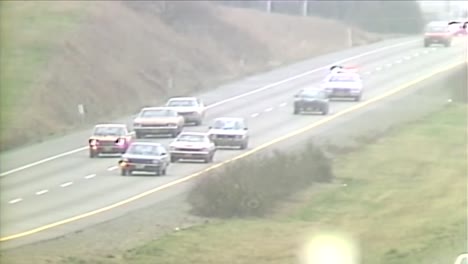 1984 state police pulling over a car on hwy