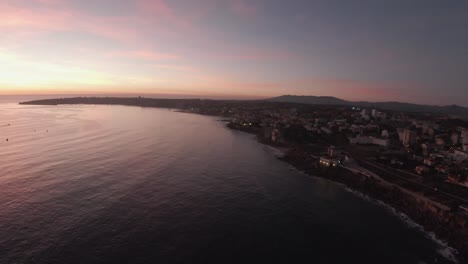 amazing and relaxing sunset from sky over sea in cascais. golden hour.