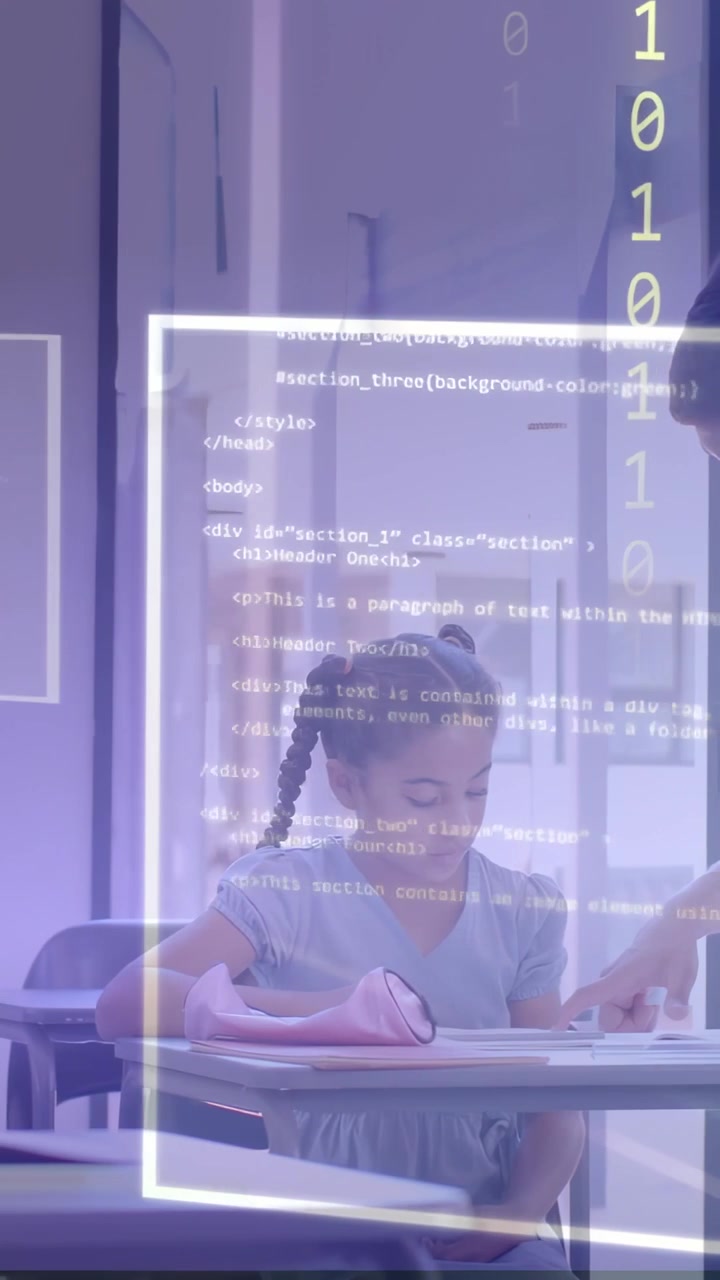 Student writing, teacher pointing starting overlaying code on workbook with pink case for education