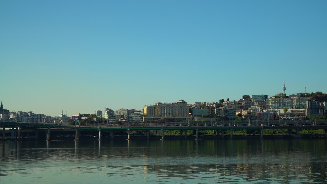 Gangbyeonbuk-ro By The Hangang River In Seoul, South Korea With Famous Namsan Seoul Tower In Distance. wide