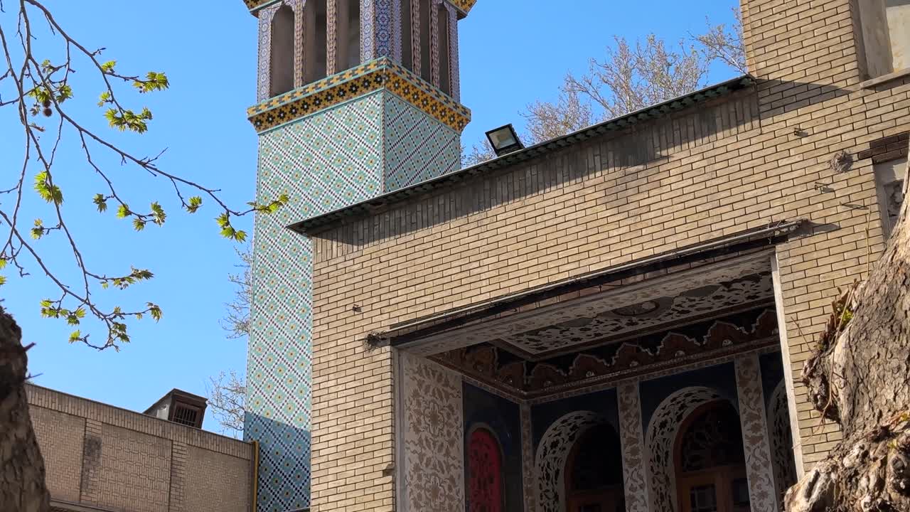 Islamic architecture with Persian design in Tehran Iran historic landmark of royal Golestan Palace Qajar era blue tile minaret culture heritage ancient mansion tourism Middle East outdoors