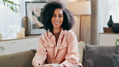 portrait of a smiling woman with afro hair