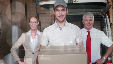 screens with data processing against caucasian delivery man and male and female supervisor smiling