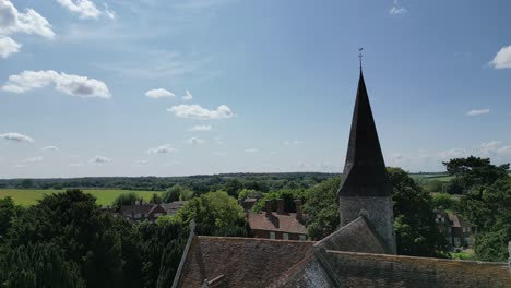 upward boom-shot of st john the evangelist church in ickham, kent