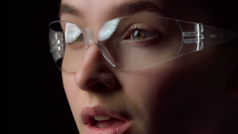 portrait of smiling businesswoman winking in virtual glasses in office.