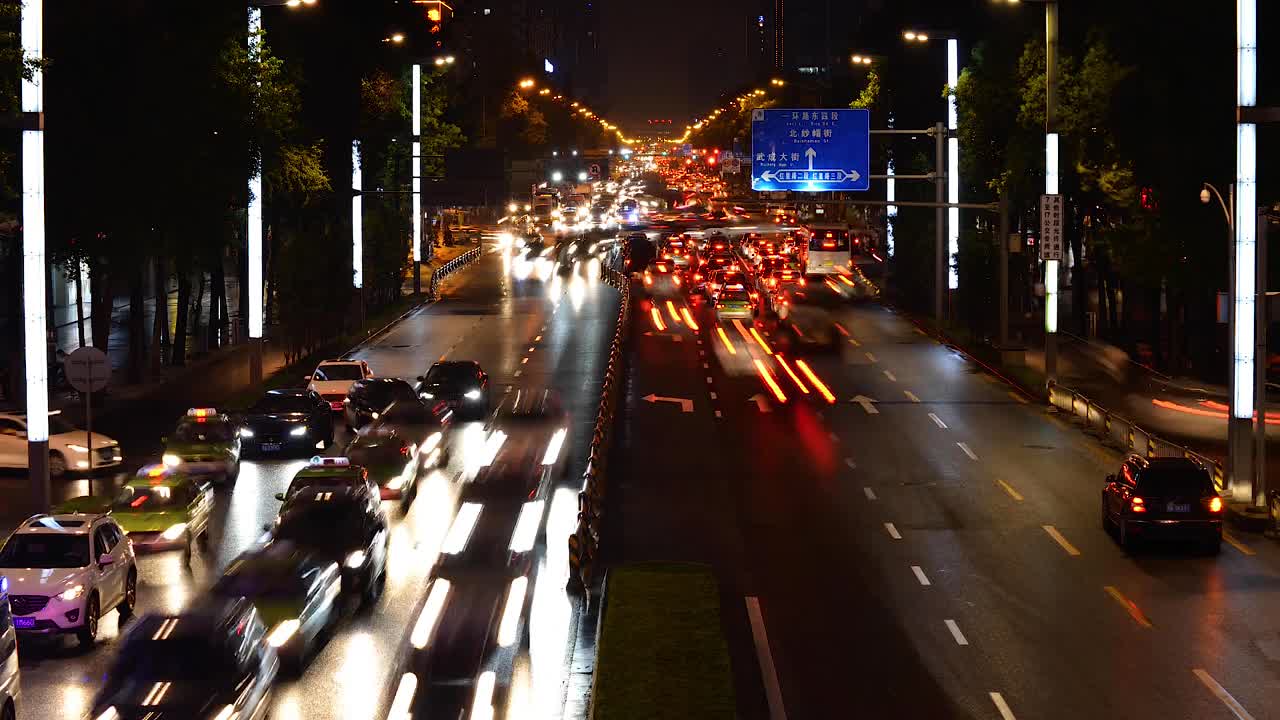 Time Lapse of traffic on a busy street at night in Chengdu, Sichuan, China. Longer shutter interval than clip 1, faster motion in the traffic.