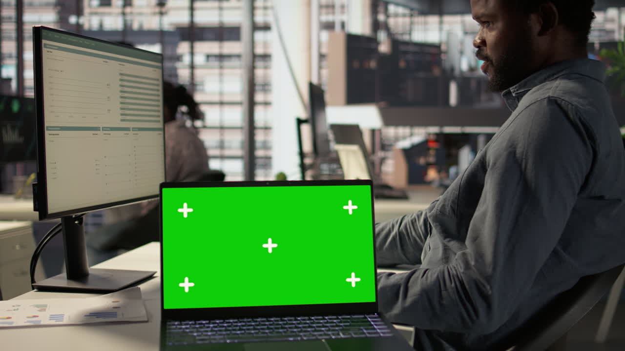 Businessman Working on Laptop in Office