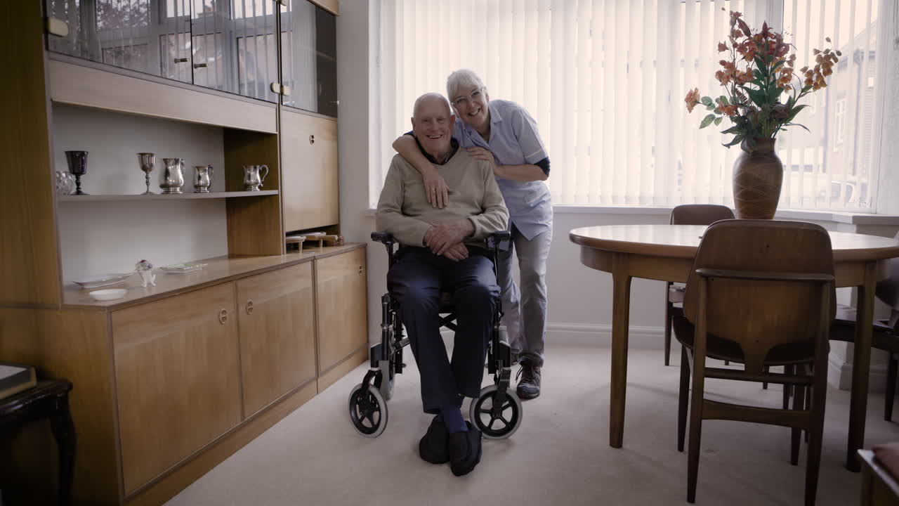 Elderly Man with Caregiver in Home Setting
