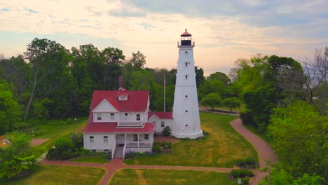 descending view of milwaukee’s north point lighthouse and lake michigan