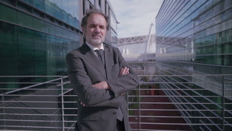 confident male boss posing with crossed arms