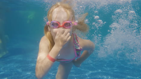 Girl-6-Years-Old-Learns-To-Dive-In-The-Pool-Slow-Motion-Video