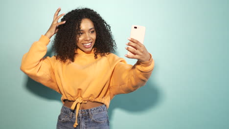 happy woman taking a selfie