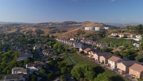 aerial view rotating over homes at lake castaic in sunny santa clarita, usa