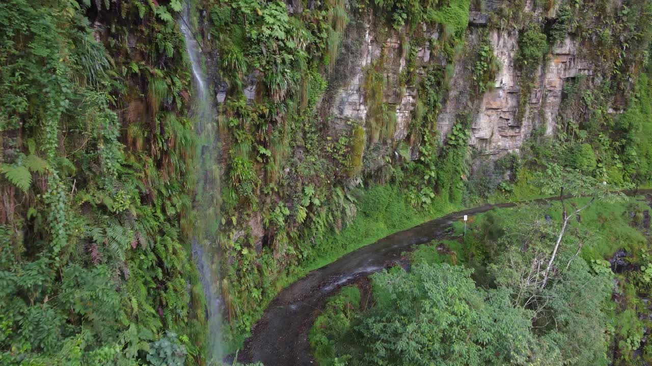 Waterfalls on overhanging section of Yungas 'Death' Road in Bolivia