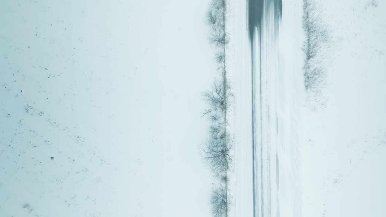 Aerial view of snowy road during storm in Mississauga, Ontario, Canada