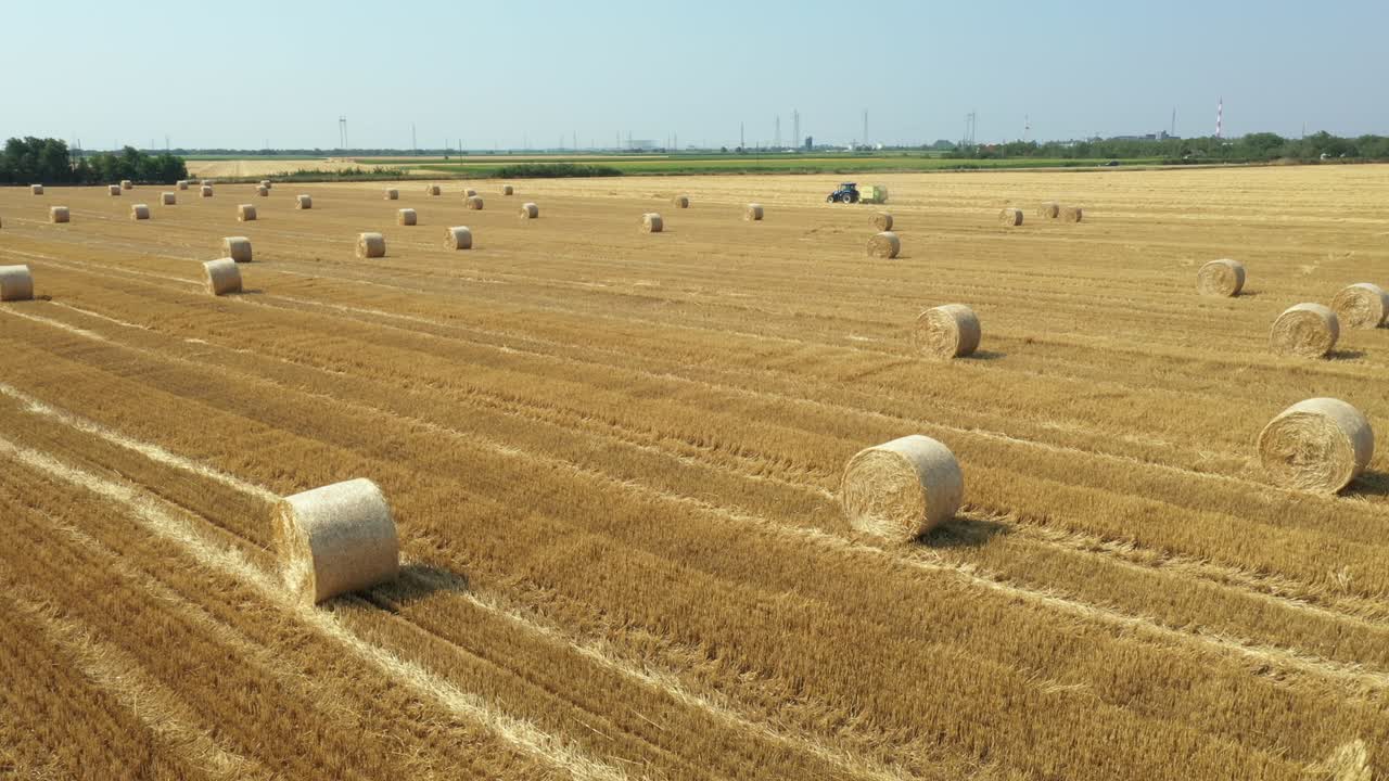 Aerial view of straw bales on farm fields
