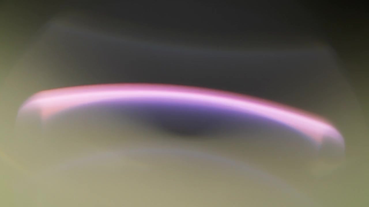 Kleurrijke abstracte lensflare-overlay. Vertraagde beweging.