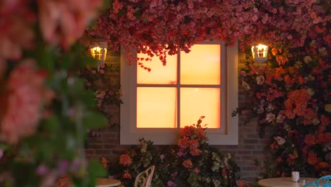 beautiful garden cafe with pink flowers and white window