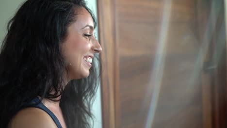 attractive, happy, infectious latina woman in a joyful teaching conversation in front of a class - isolated