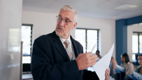 professor giving lecture in classroom