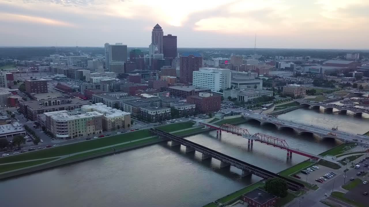 Aerial Drone Footage Of The Des Moines River, Bridges And Streets And High Rise Buildings Of Downtown Des Moines Iowa