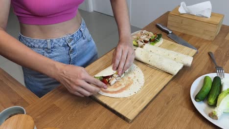 woman making wraps