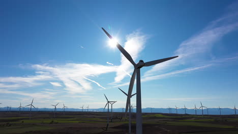 wind-turbines-in-Spain-aerial-shot-sunny-windy-day-la-Muela-town-rural-landscape