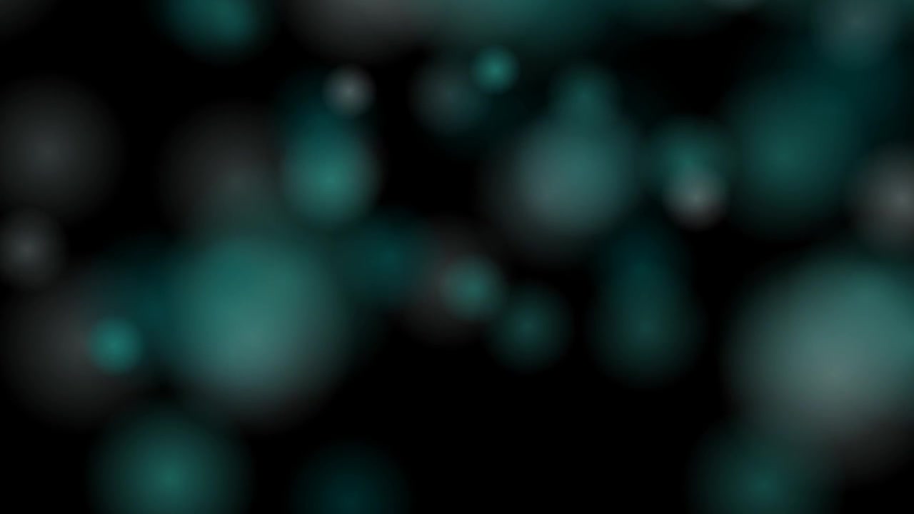 Abstract Teal and Grey Bokeh Light Particles on Black Background