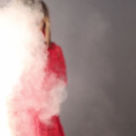 young woman posing in fog