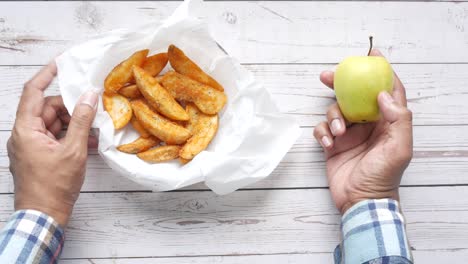 chips vs apple - a comparison of healthy and unhealthy options