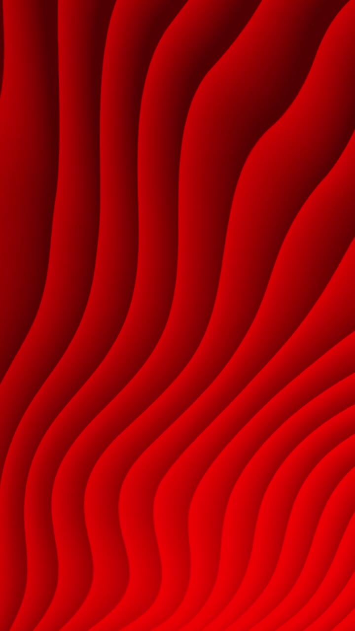 A mesmerizing red background with smooth textures for creative projects.
