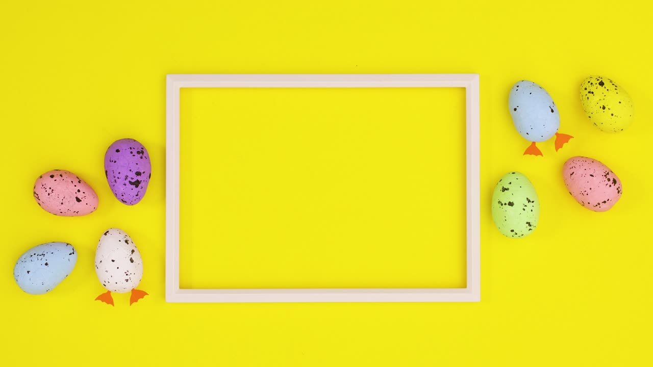 Happy Easter eggs move around frame for text on yellow theme. Stop motion